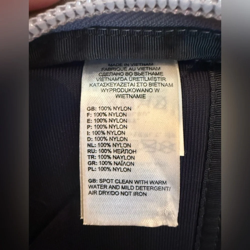 The North Face Gray and Black Backpack with Orange Logo